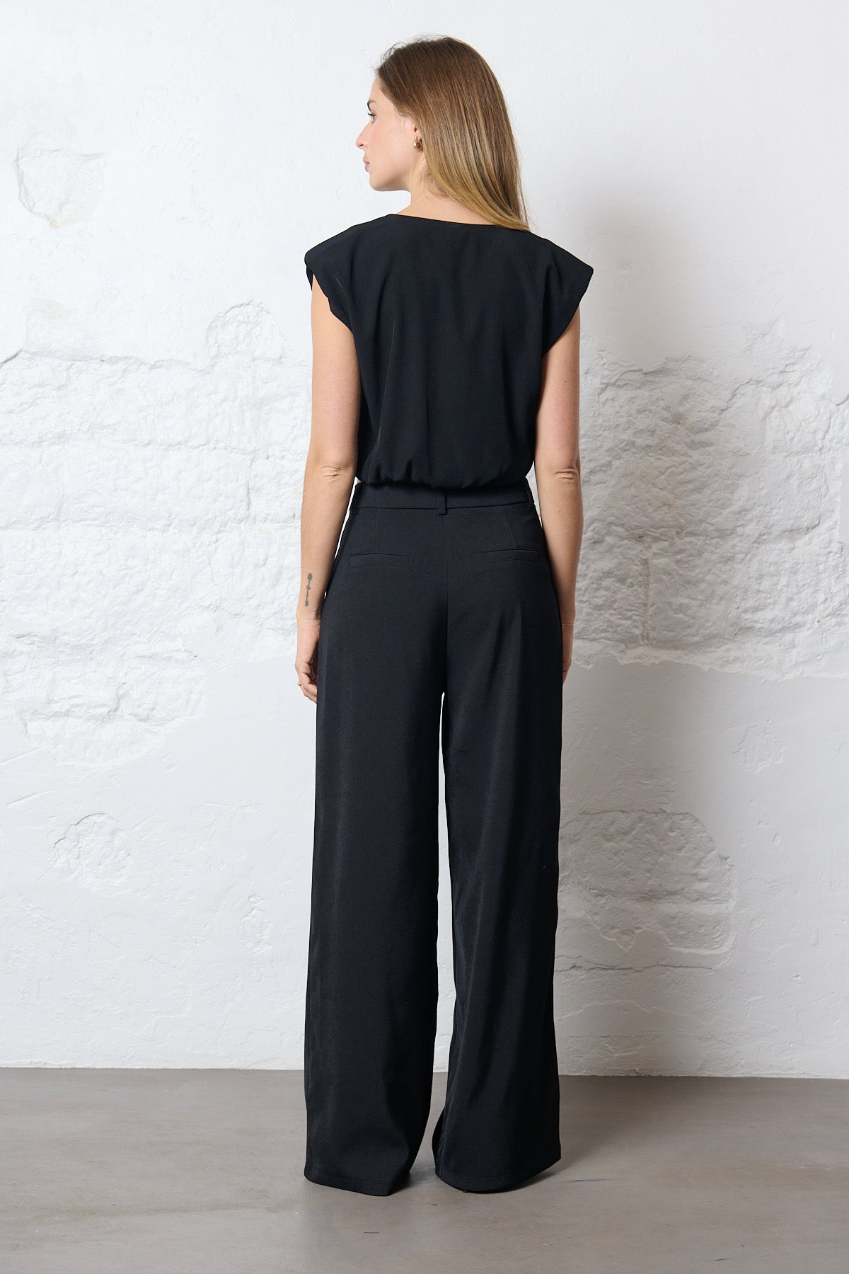 Regular fit trousers available in black and dark grey FEELKOO
