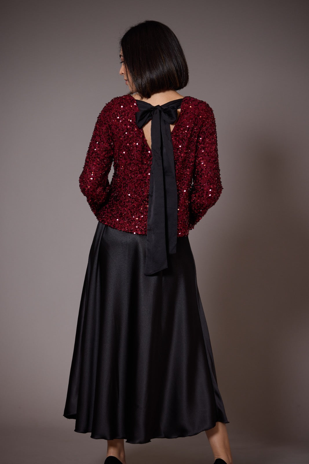 Sequined top with black bow on the neck Luisa Fashion
